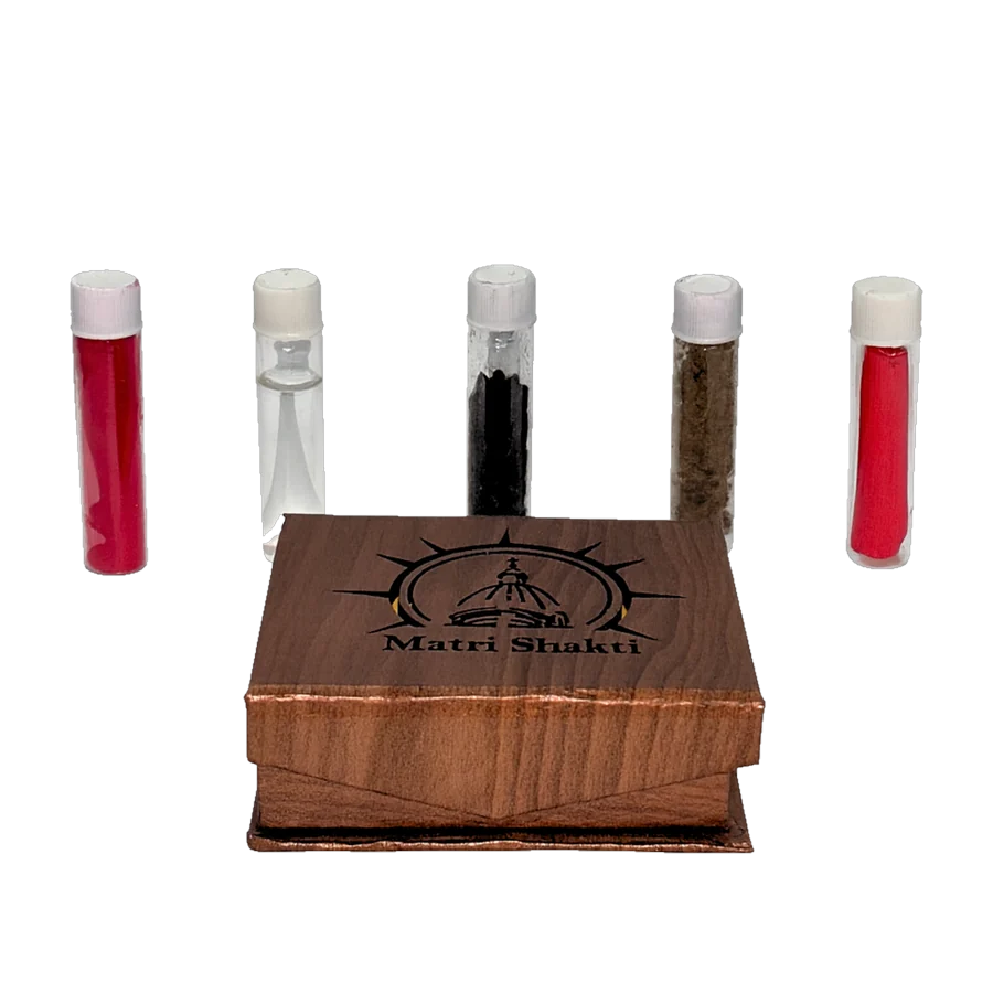 The five sealed vials beside the closed Matri Sakti wooden box